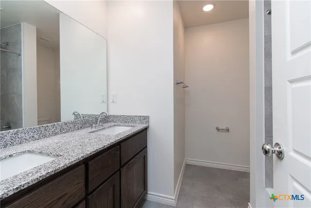 a view of yard with wooden fence