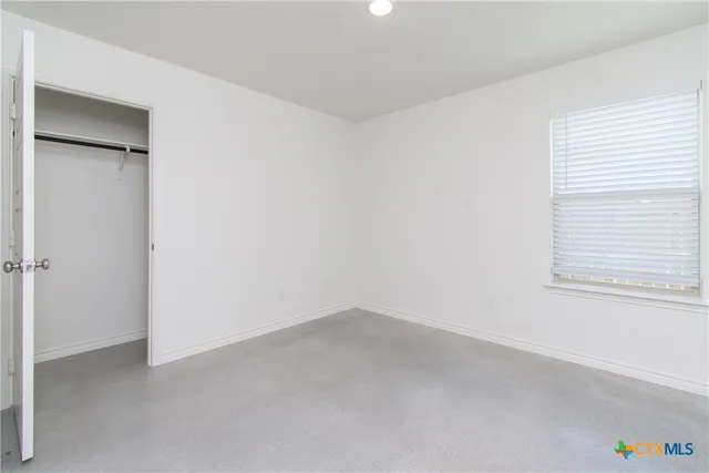 an empty room with a window
