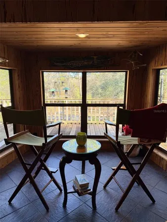 a bathroom with a double vanity sink a toilet and a mirror