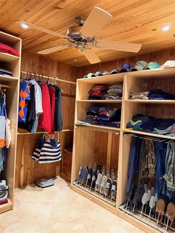 a view of a chairs and table in the back yard