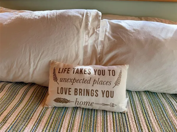 a view of a porch with seating space