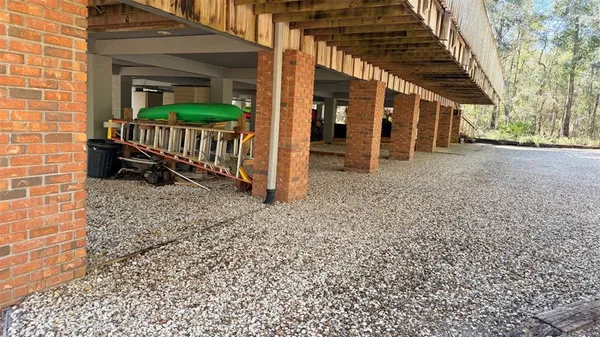 a view of a small house with roof deck