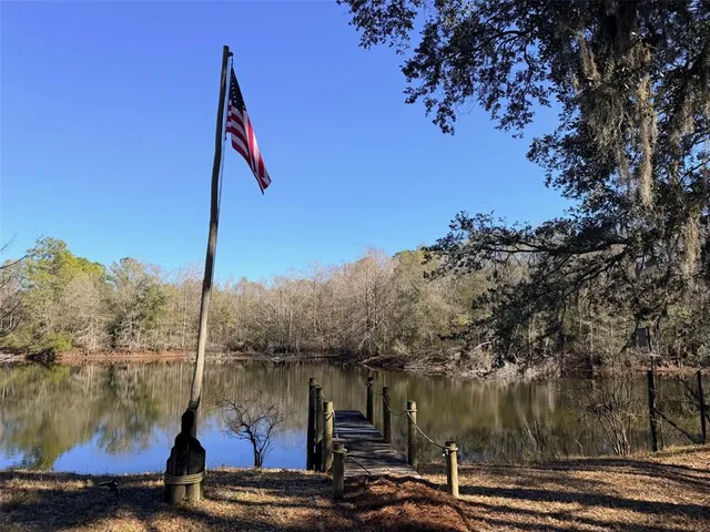 a kitchen with stainless steel appliances granite countertop a stove and a refrigerator