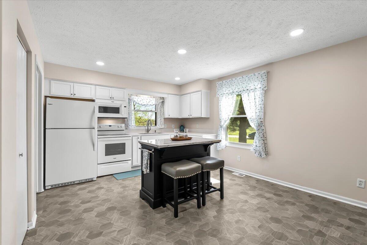 6979 Howe Road Bath, MI 48808 - Photo 5 of 25 5