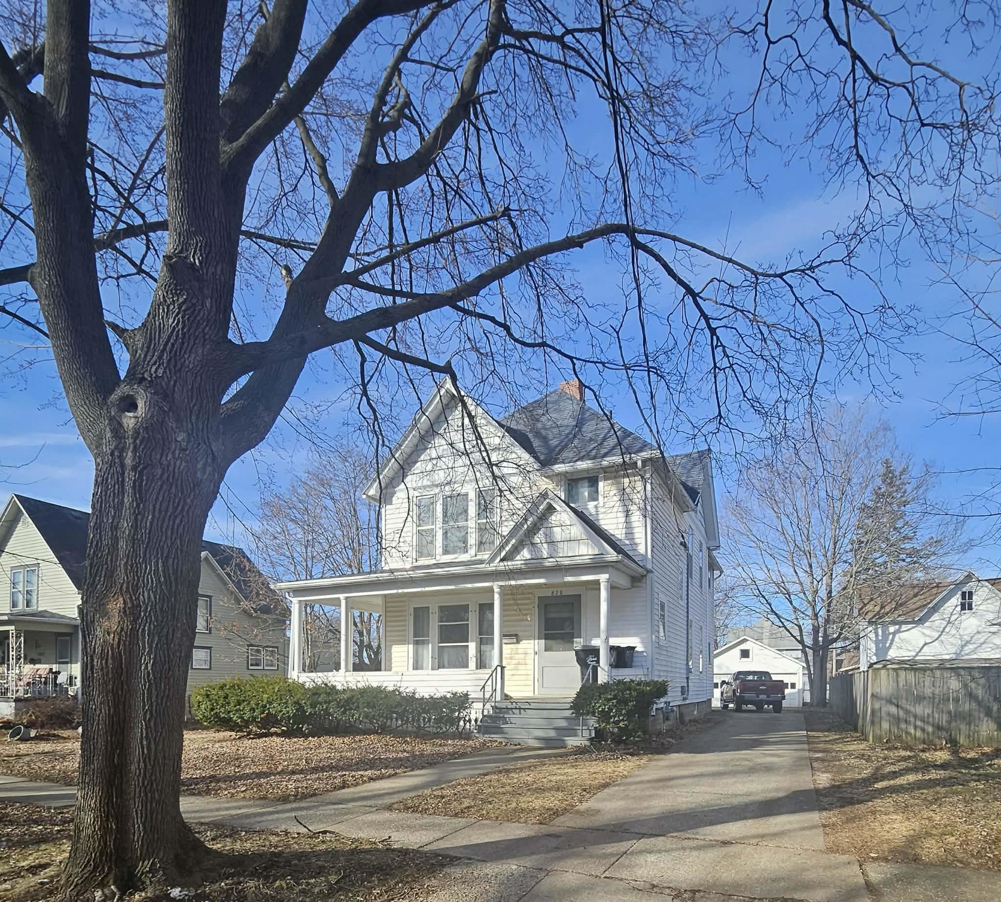 828 9th Street Beloit, WI 53511 - Photo 15 of 23 a front view of a house with a yard