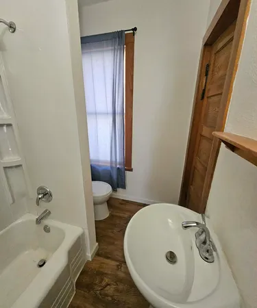 a bathroom with a sink and a tub
