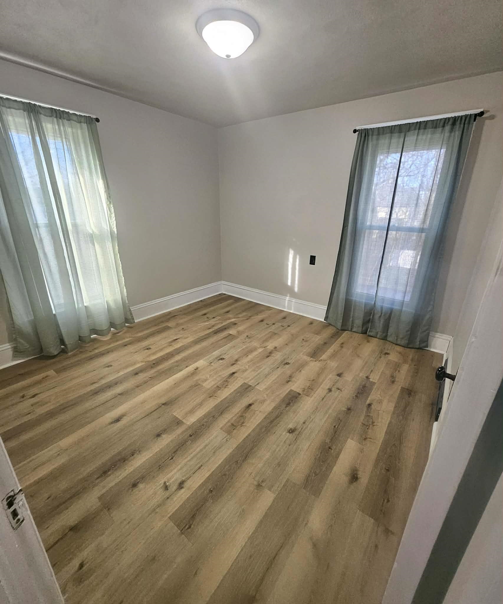 828 9th Street Beloit, WI 53511 - Photo 8 of 23 a view of empty room with window