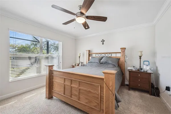 a bedroom with a bed and a cabinets
