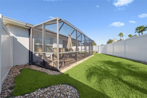 a view of a house with backyard