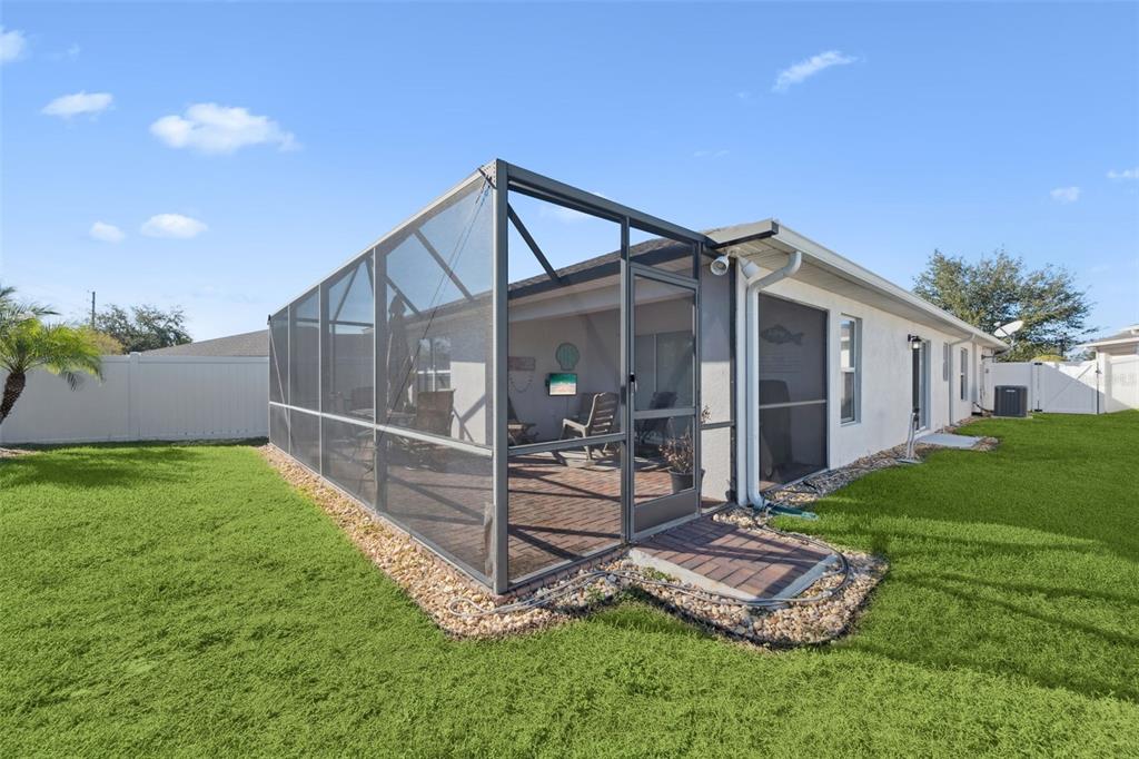 3365 Raleigh Drive Winter Haven, FL 33884 - Photo 23 of 39 a view of a house with backyard