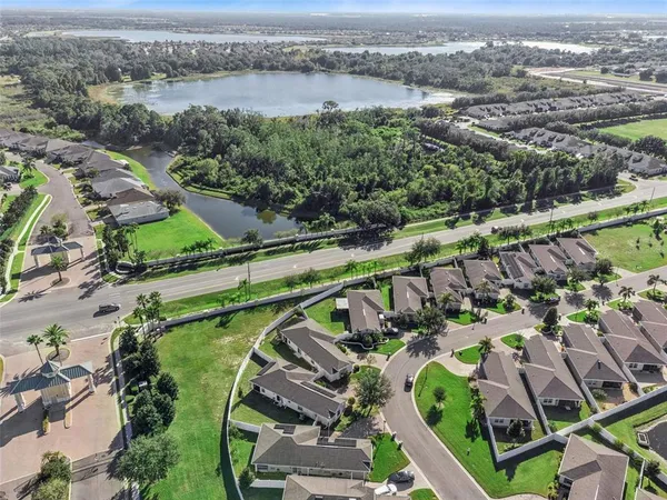 an aerial view of a city with lots of residential buildings