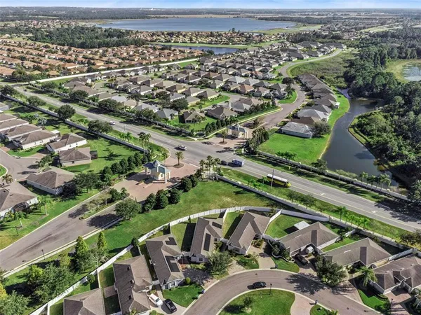 an aerial view of a house with a garden