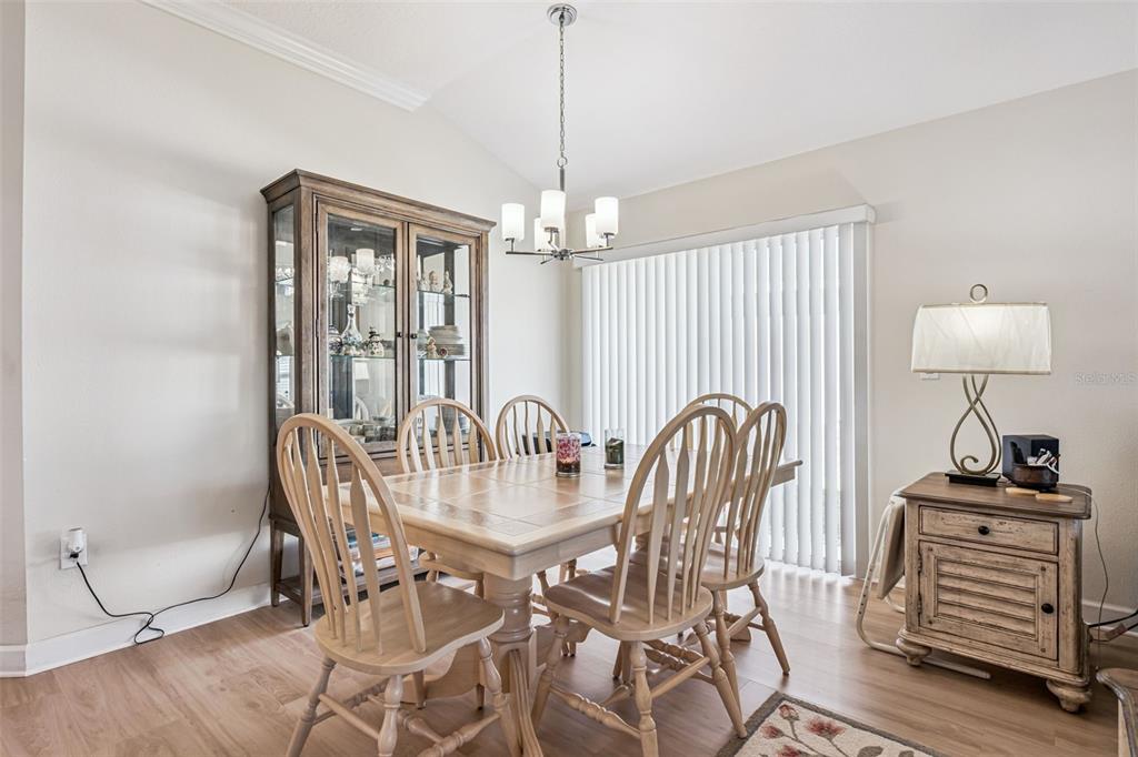 3365 Raleigh Drive Winter Haven, FL 33884 - Photo 4 of 39 a dining room with furniture and window