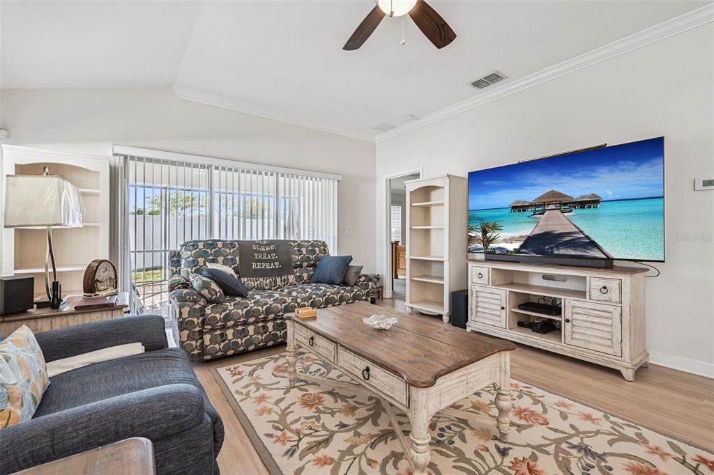 3365 Raleigh Drive Winter Haven, FL 33884 - Photo 5 of 39 a living room with furniture and a rug