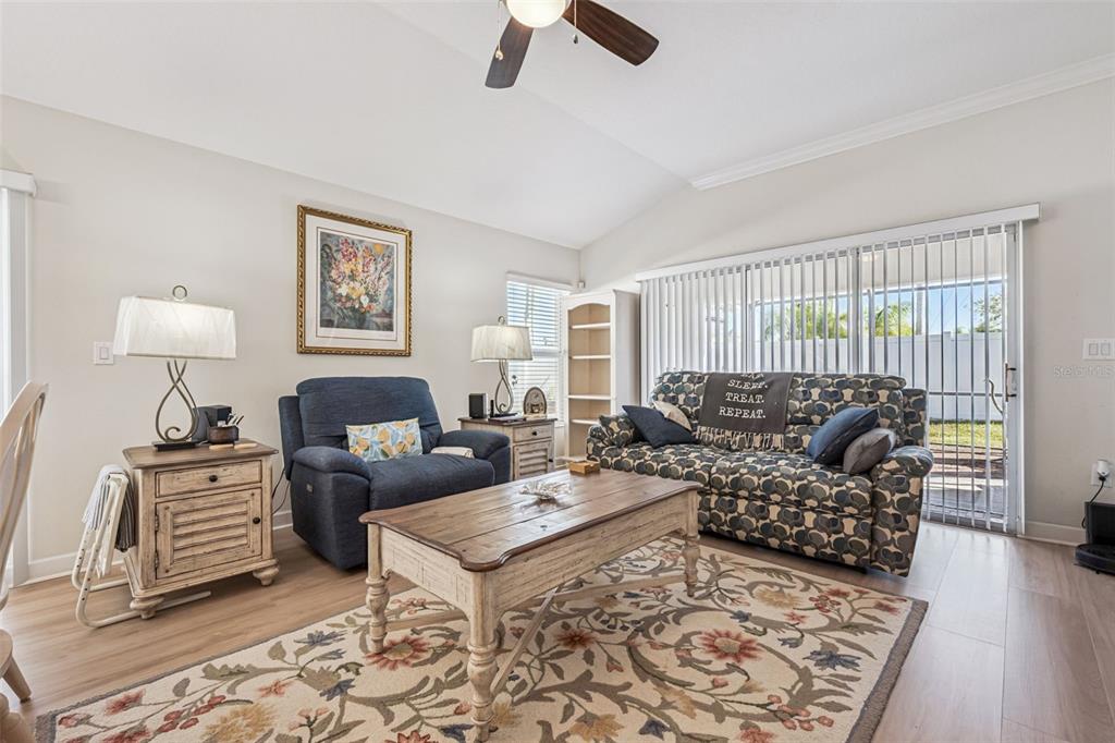 3365 Raleigh Drive Winter Haven, FL 33884 - Photo 7 of 39 a living room with furniture and a rug