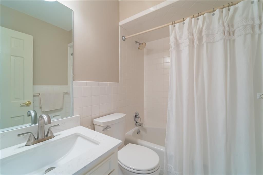 192 Devonwood Drive Pittsburgh, PA 15241 - Photo 14 of 25 a white toilet sitting next to a bathroom sink