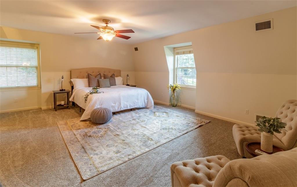 192 Devonwood Drive Pittsburgh, PA 15241 - Photo 16 of 25 a spacious bedroom with a bed and window