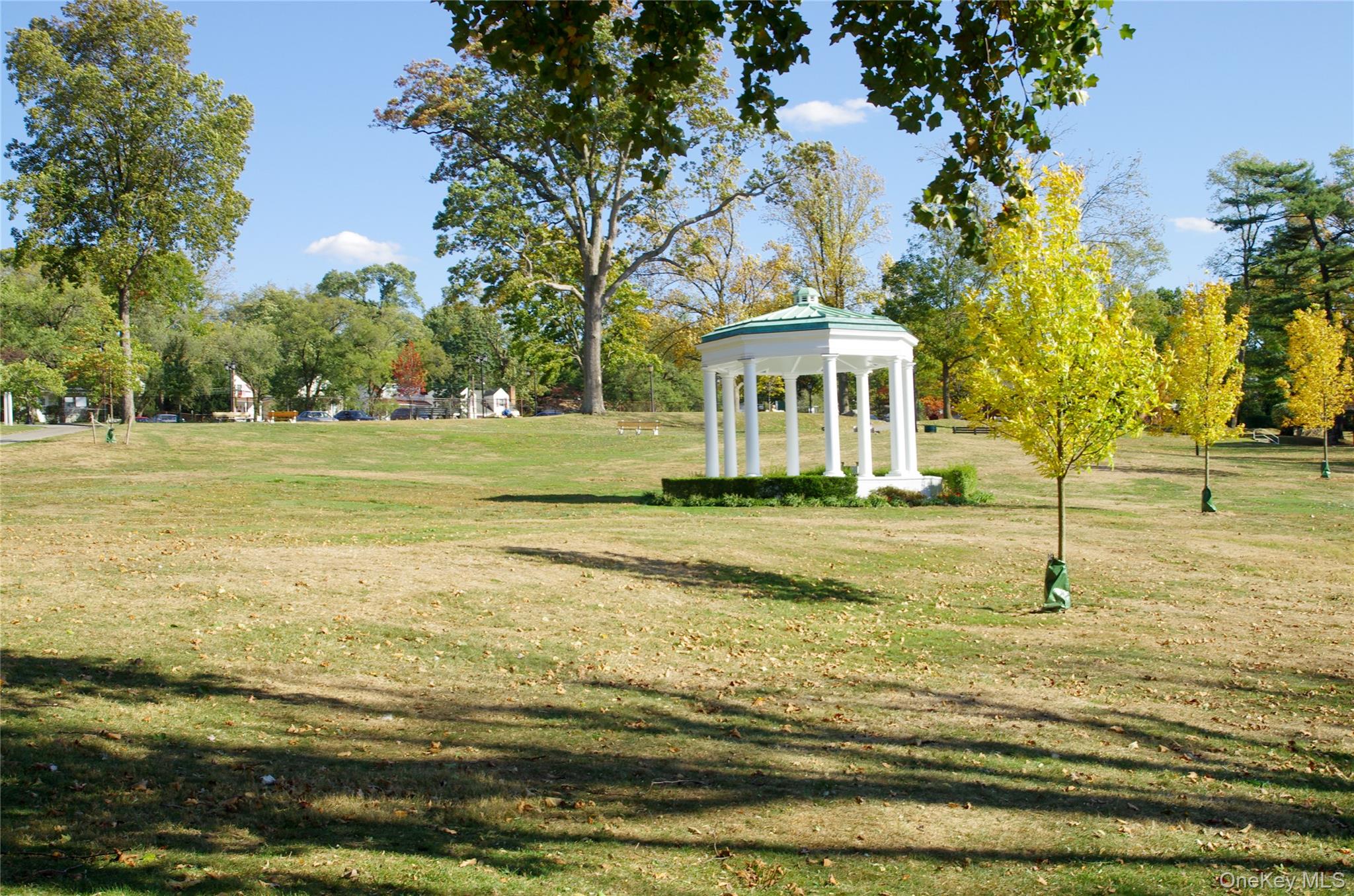 2 Seaman Road Glen Cove, NY 11542 - Photo 11 of 15 a view of a swimming pool with a house in the background