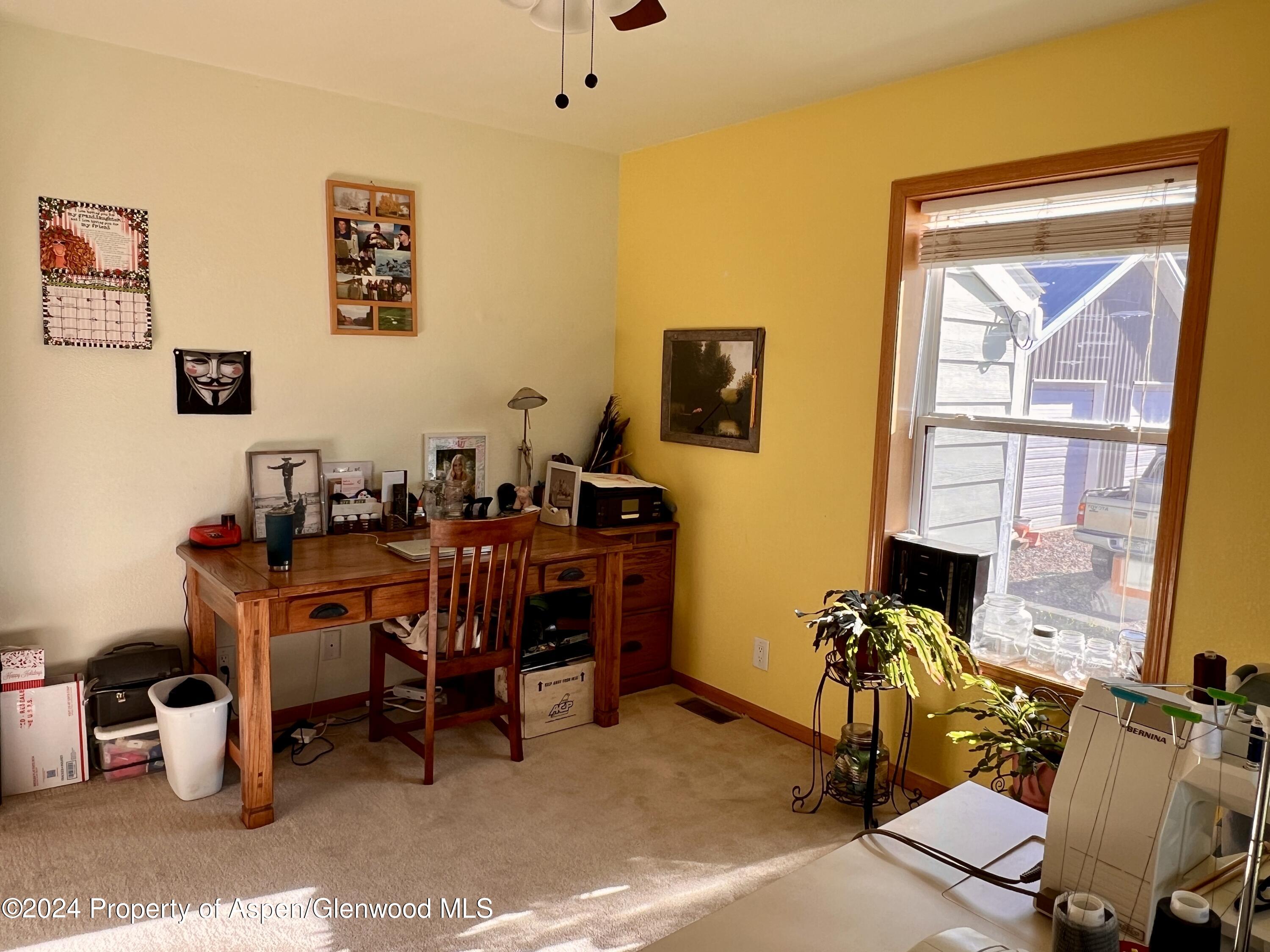 709 Rimrock Drive Meeker, CO 81641 - Photo 15 of 27 a view of a workspace with furniture