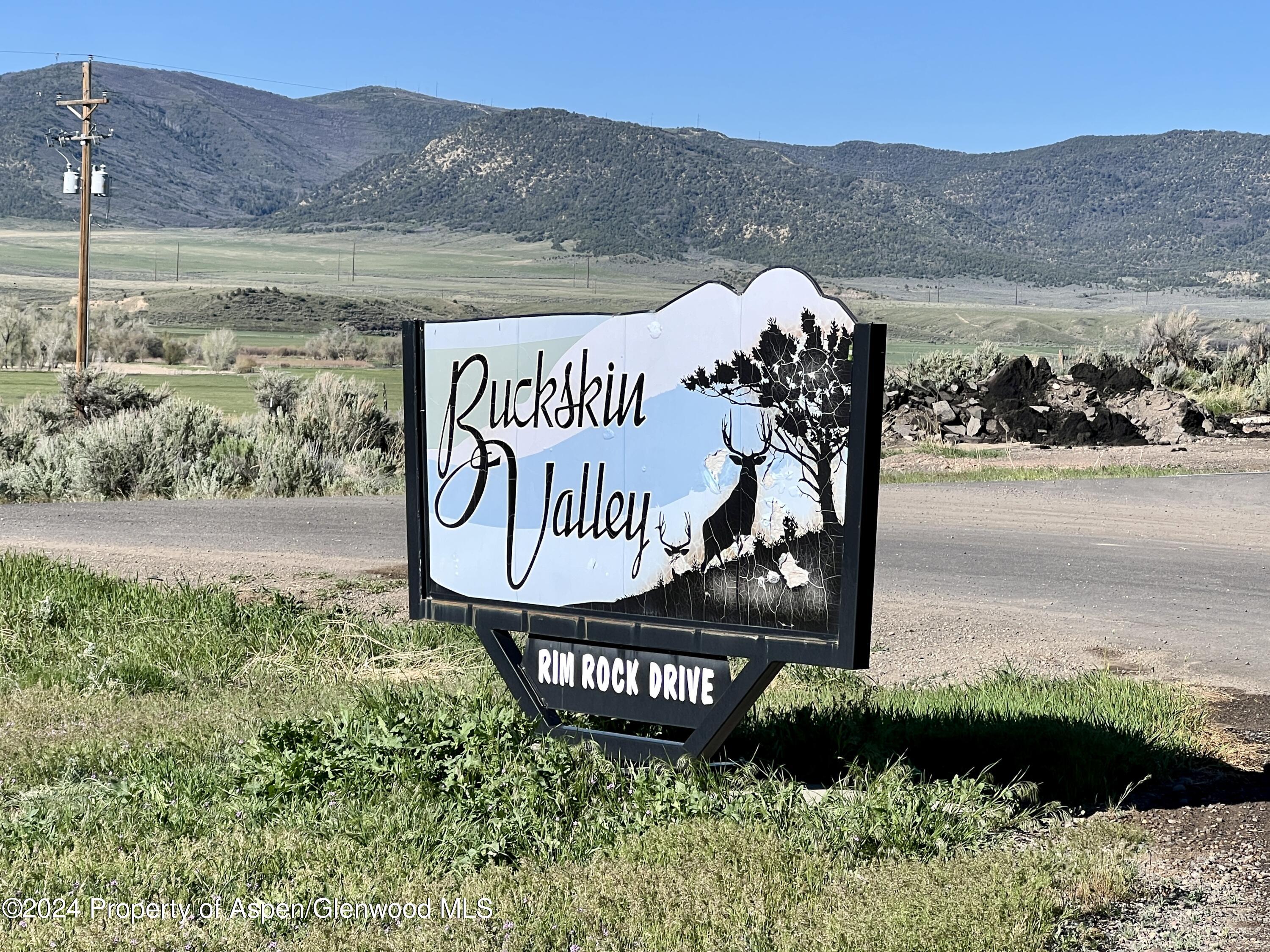 709 Rimrock Drive Meeker, CO 81641 - Photo 27 of 27 a view of a sign board with a lake view