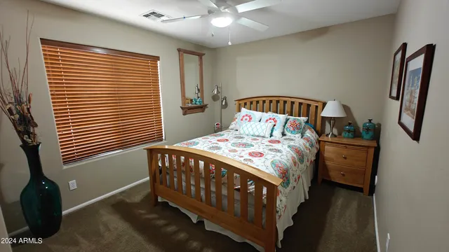 a view of a back yard with patio