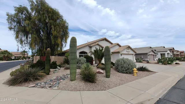 a view of a street with a house