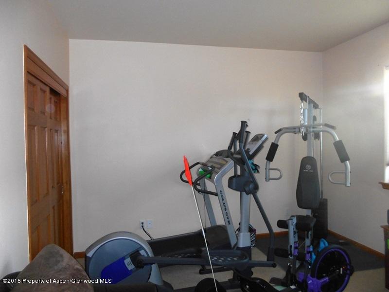 1068 East 17th Street Rifle, CO 81650 - Photo 8 of 9 a room with gym equipment