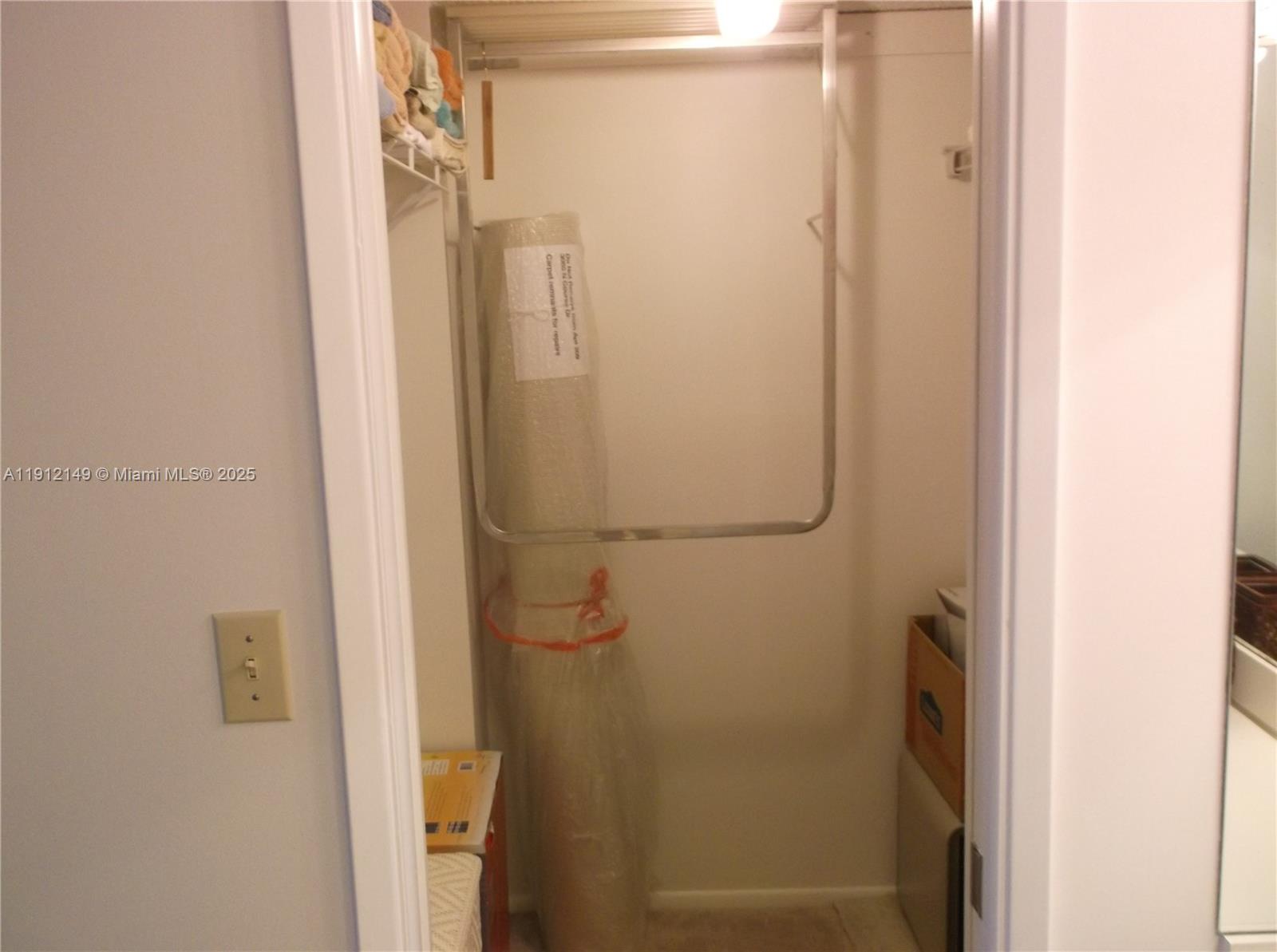 3080 North Course Drive, Unit 209 Pompano Beach, FL 33069 - Photo 12 of 35 a bathroom with a glass shower door