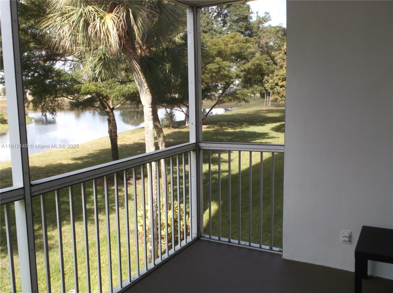 3080 North Course Drive, Unit 209 Pompano Beach, FL 33069 - Photo 22 of 35 a view of backyard from window