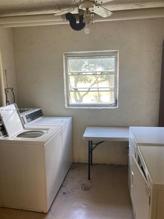 3080 North Course Drive, Unit 209 Pompano Beach, FL 33069 - Photo 23 of 35 a utility room with dryer and washer