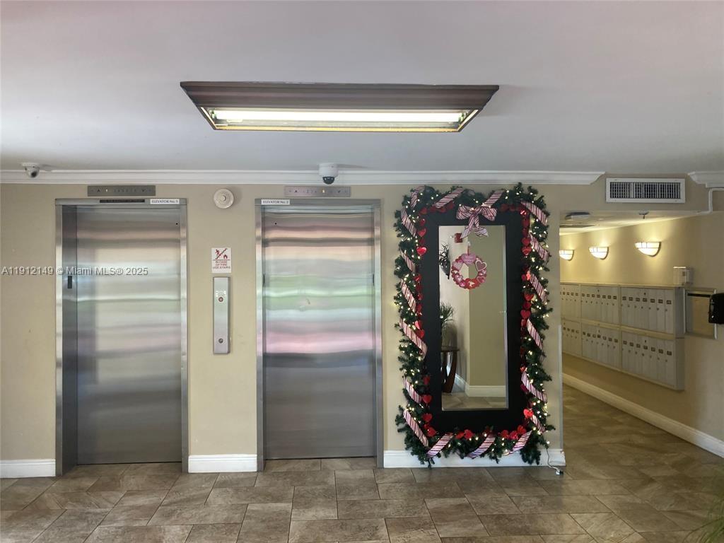3080 North Course Drive, Unit 209 Pompano Beach, FL 33069 - Photo 24 of 35 a view of water heater room