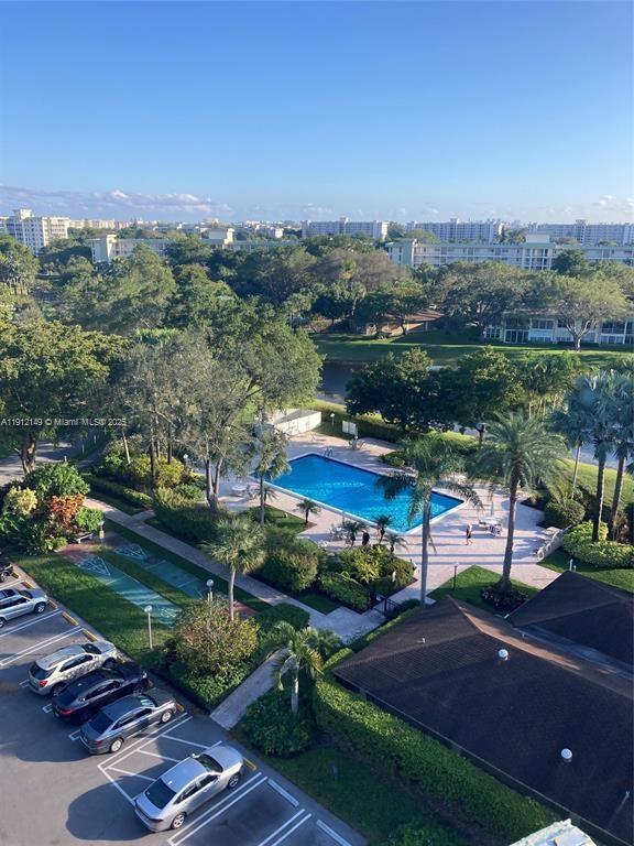 3080 North Course Drive, Unit 209 Pompano Beach, FL 33069 - Photo 27 of 35 a view of a city street view and lake view