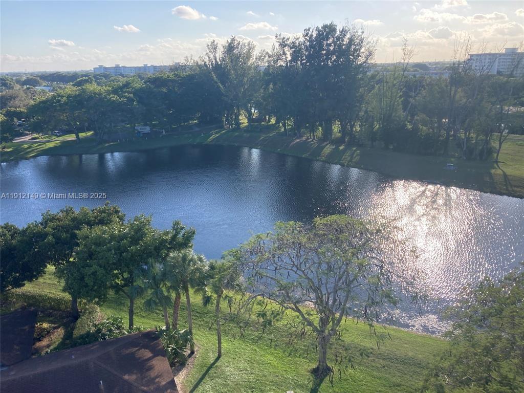 3080 North Course Drive, Unit 209 Pompano Beach, FL 33069 - Photo 29 of 35 a view of a lake from a yard