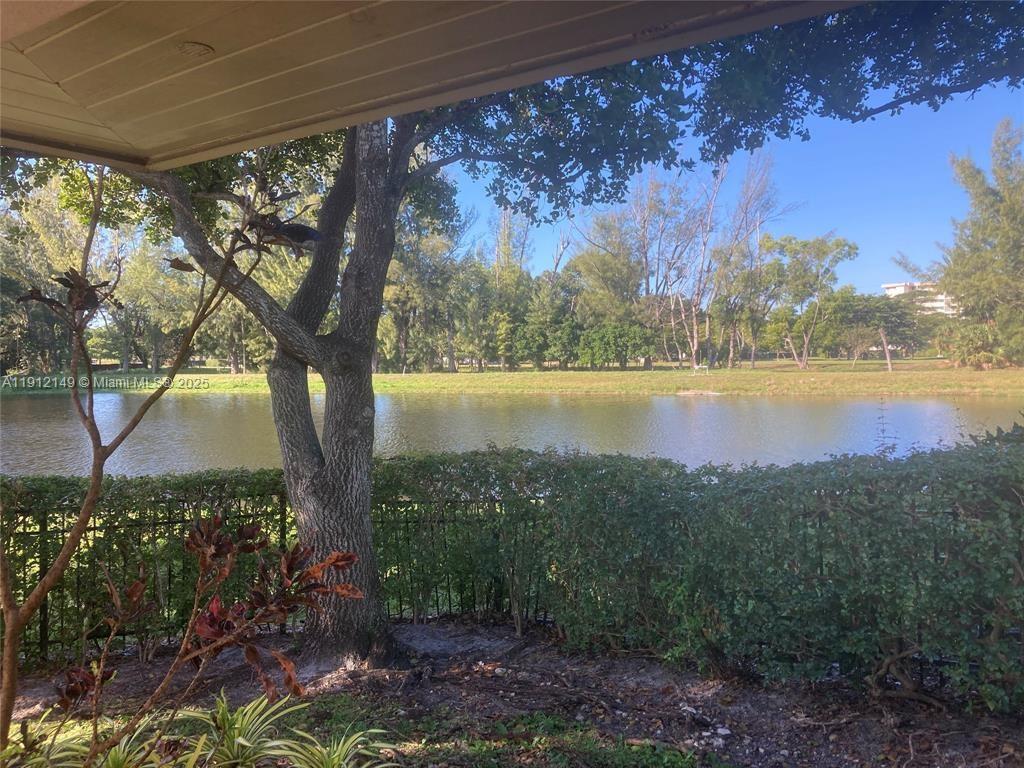 3080 North Course Drive, Unit 209 Pompano Beach, FL 33069 - Photo 30 of 35 a view of lake with green space