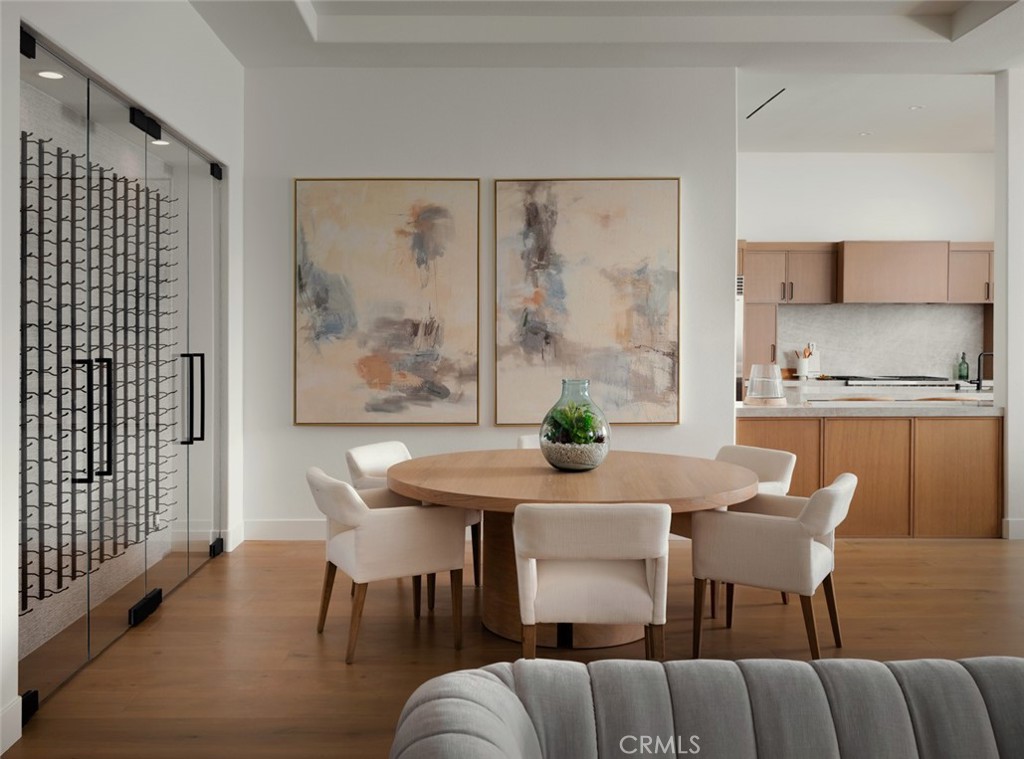 76476 Via Chianti Indian Wells, CA 92210 - Photo 11 of 74 a view of a dining room with furniture and wooden floor