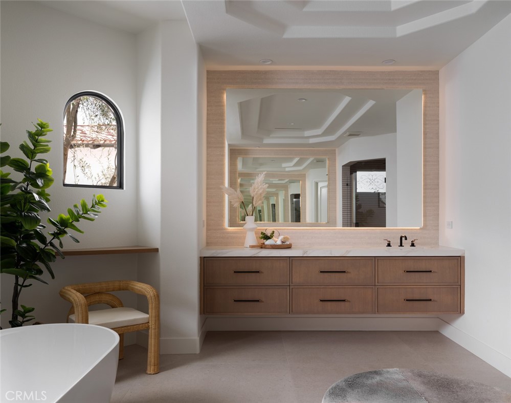 76476 Via Chianti Indian Wells, CA 92210 - Photo 28 of 74 a bathroom with a sink and a mirror