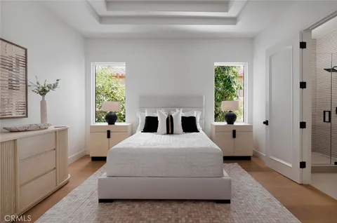 a view of a house with a swimming pool and sitting area