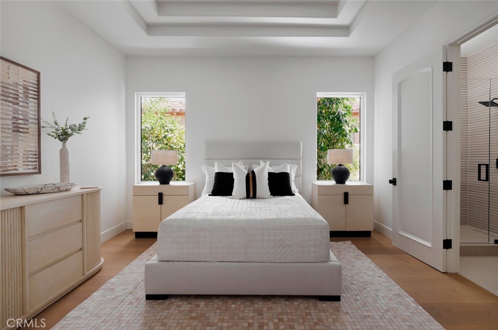 76476 Via Chianti Indian Wells, CA 92210 - Photo 31 of 74 a spacious bedroom with a large bed and a window