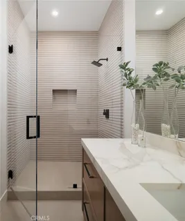 a view of a house with swimming pool and sitting area