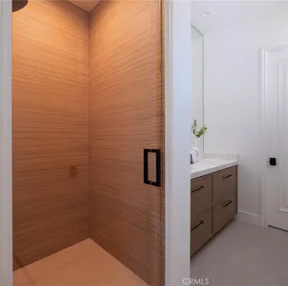 a view of a house with swimming pool and sitting area