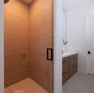 front view of a house with a garden