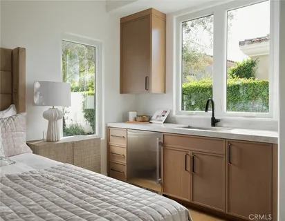 a living room with furniture and a garden