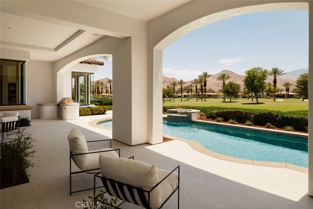76476 Via Chianti Indian Wells, CA 92210 - Photo 43 of 74 a view of a patio with a yard