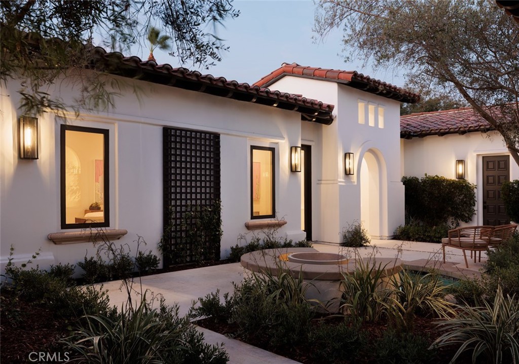 76476 Via Chianti Indian Wells, CA 92210 - Photo 49 of 74 a front view of a house with a yard