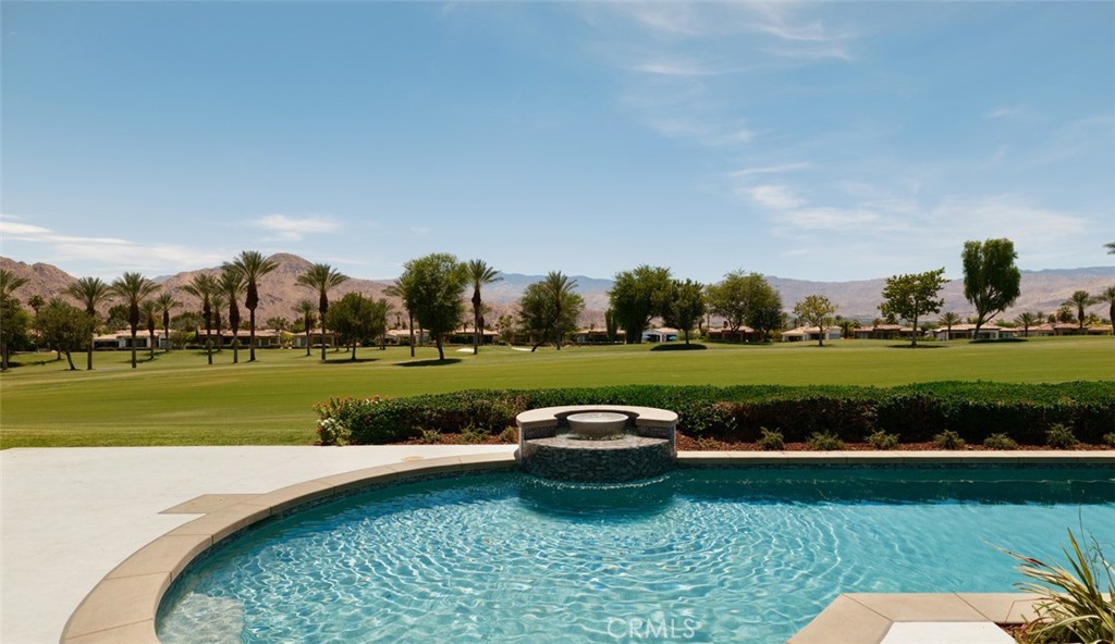 76476 Via Chianti Indian Wells, CA 92210 - Photo 59 of 74 a view of a golf course with a lake
