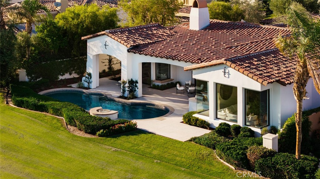 76476 Via Chianti Indian Wells, CA 92210 - Photo 68 of 74 a view of a house with backyard porch and sitting area