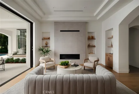 a terrace with outdoor seating and water view