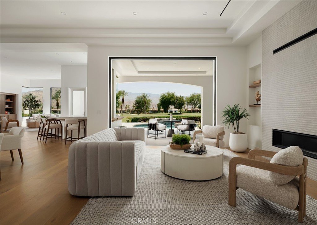 76476 Via Chianti Indian Wells, CA 92210 - Photo 8 of 74 a living room with furniture and a large window