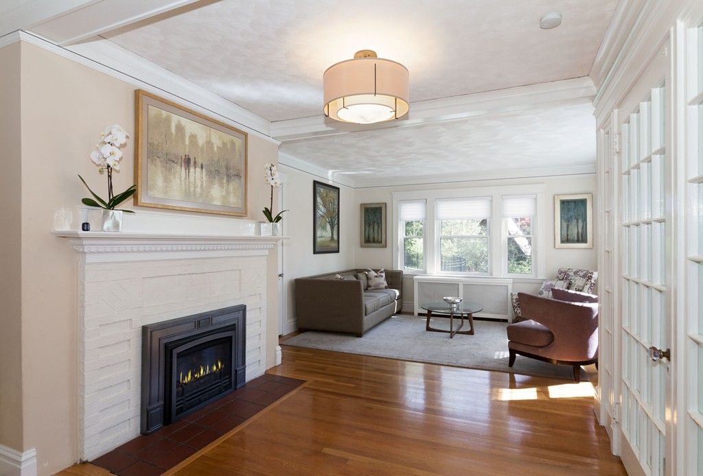 64 Bonad Road Newton, MA 02465 - Photo 4 of 16 a living room with furniture and a fireplace