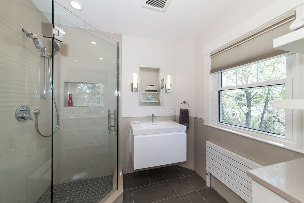 64 Bonad Road Newton, MA 02465 - Photo 10 of 16 a bathroom with a sink toilet and shower